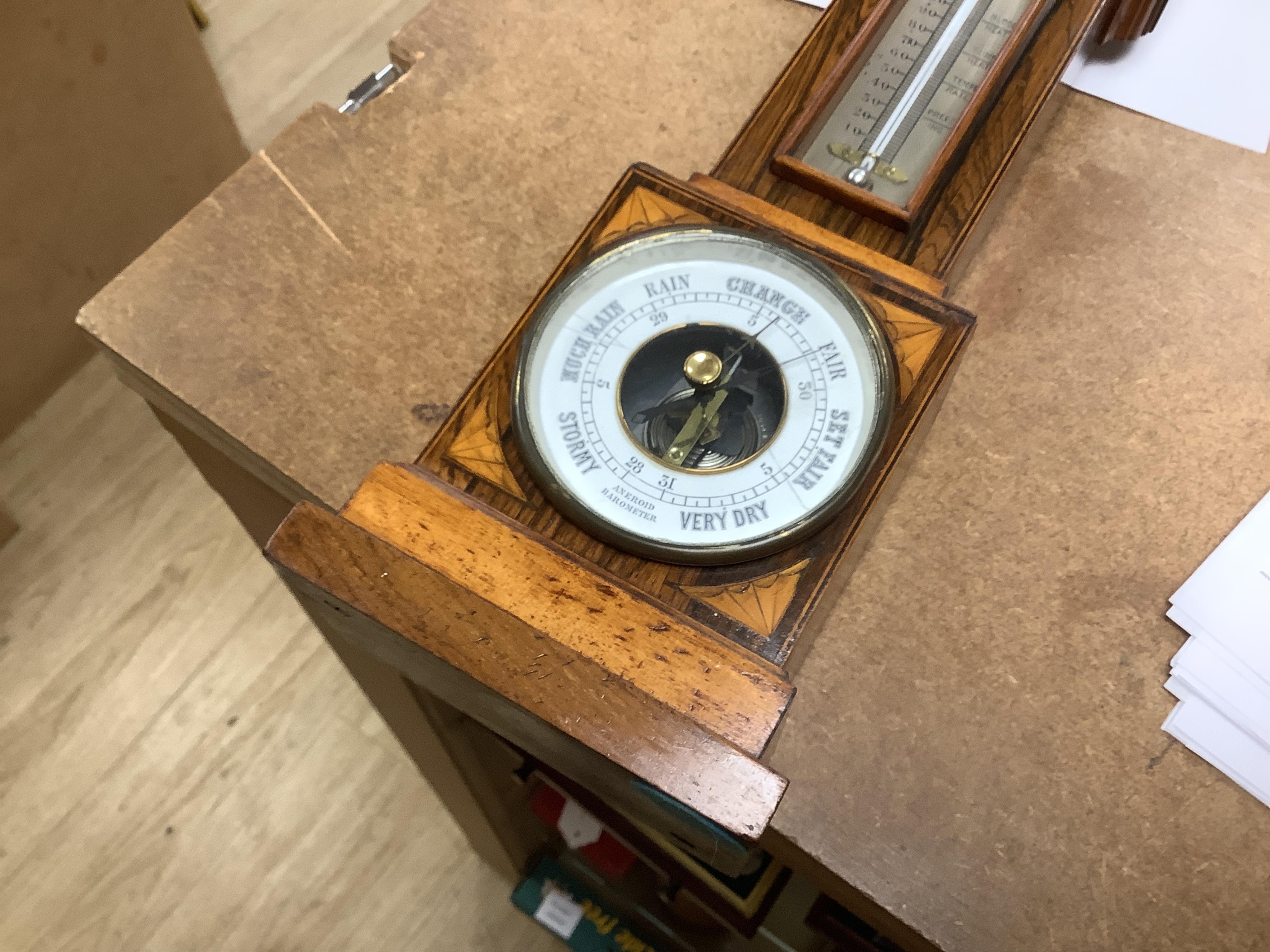 A miniature inlaid rosewood longcase clock with French movement and integral aneroid barometer and thermometer, the dial inscribed Aldis, Pimlico, 47cm high
